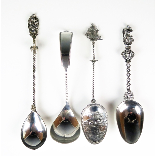 514 - A collection of four continental silver spoons and ladle, of various designs, total weight of silver... 