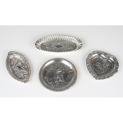 521 - Four assorted silver pin trays, various makers and dates, including heart-shaped example, all with e... 