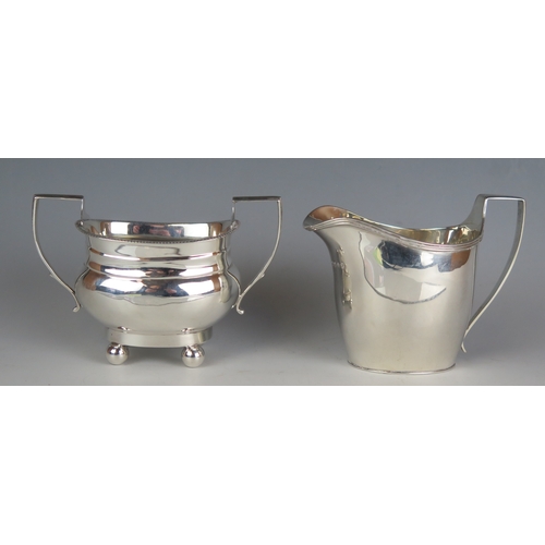 530 - A George V silver twin handles sugar basin, maker Elkington & Co, Birmingham, 1919, raised on ball f... 