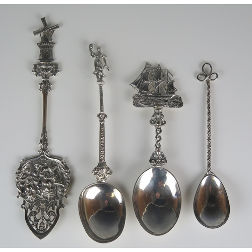 536 - Four assorted Dutch and continental silver spoons, with ship, windmill and other decoration, total w... 