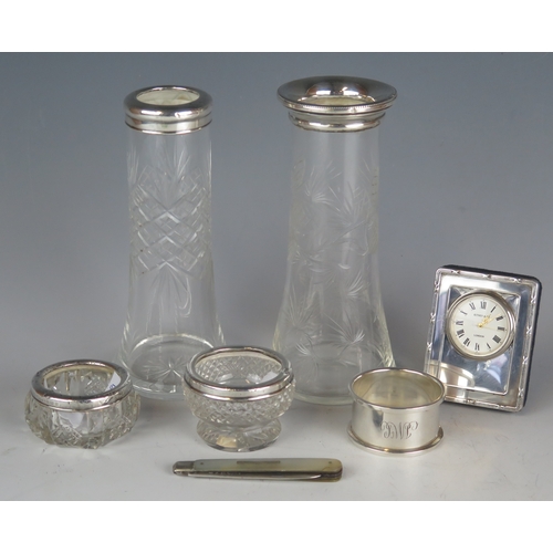 538 - A Mixed collection of silver wares, various makers and dates, includes clear glass and silver mounte... 