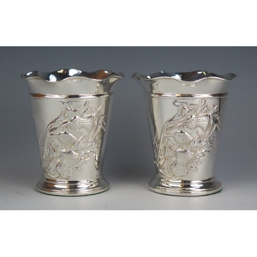 559 - A pair of Edwardian silver vases, maker Henry Matthews, Chester, 1905, of flared tapering form with ... 