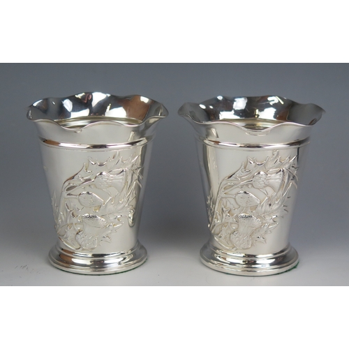 559 - A pair of Edwardian silver vases, maker Henry Matthews, Chester, 1905, of flared tapering form with ... 