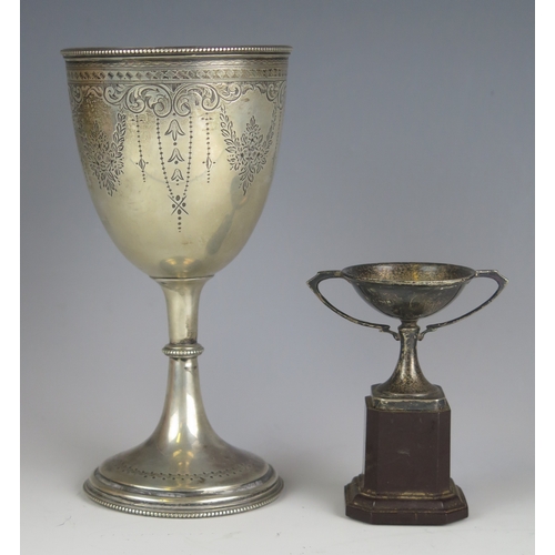 568 - A Victorian silver trophy cup, maker Fenton Brothers, Sheffield, 1868, inscribed, with garland decor... 