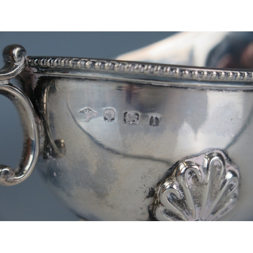 578 - An Edward VII silver sauce boat, maker W Spurrier & Co, Birmingham, 1908, of traditional design, wit... 