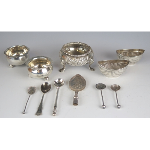 582 - A mixed collection of silver condiments including a pair of oval salts, a Victorian salt, assorted s... 