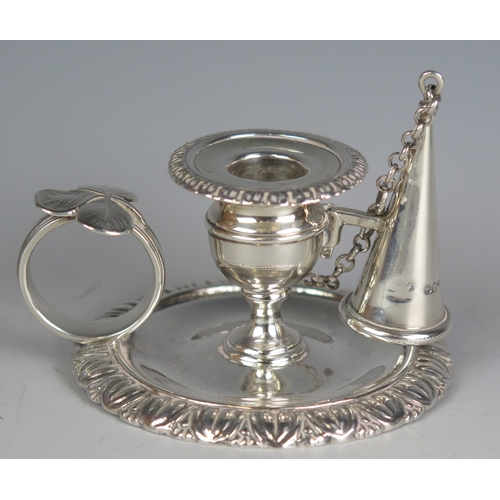 596 - A Victorian silver chamberstick, maker George Gilliam, London, 1890, with urn-shaped sconce on a cir... 