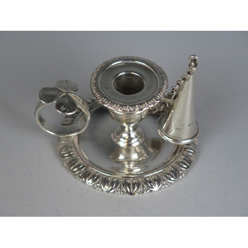 596 - A Victorian silver chamberstick, maker George Gilliam, London, 1890, with urn-shaped sconce on a cir... 