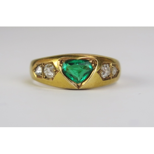 61 - A Victorian 18ct Gold, Emerald and Old Cut Diamond Ring, c. 6.55x4.85mm principal heart shaped stone...