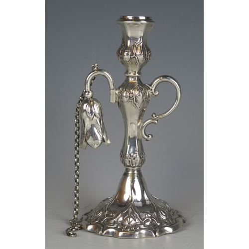 611 - A Victorian silver chamberstick, , maker Henry Wilkinson & Co, Sheffield, 1851, with urn-shaped scon... 