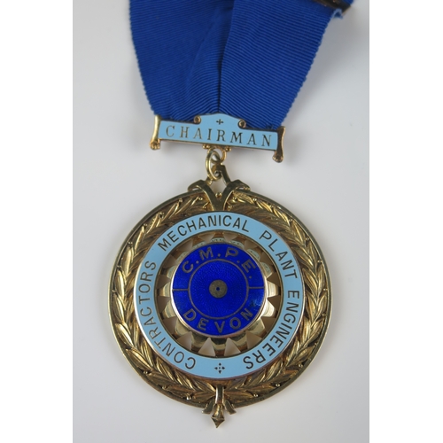 623 - A Silver gilt and enamel medallion for the Contractors Mechanical Plant Engineers, with ribbon and t... 