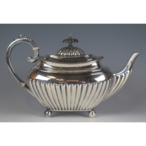 624 - An Edward VII silver teapot, maker James Dixon & Sons Ltd, Sheffield, 1901, of barge-shaped outline,... 