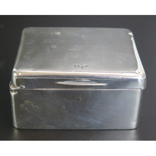 630 - A George V silver cigarette case, maker Walker & Hall, Sheffield, 1910, of rectangular outline, with... 