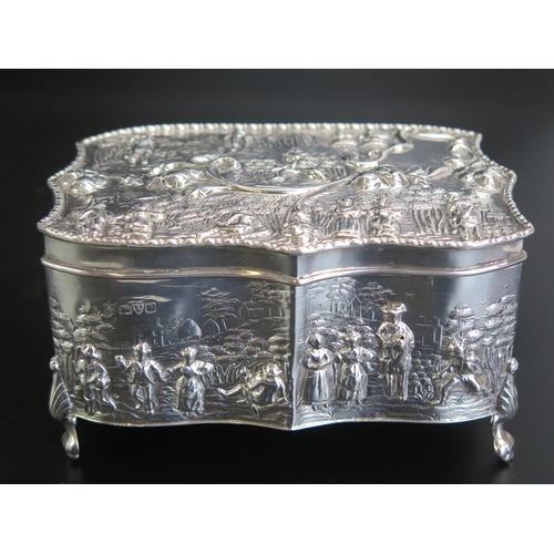 631 - An Edward VII silver jewellery casket, maker George Natham & Ridley Hayes , Chester 1909, of serpent... 