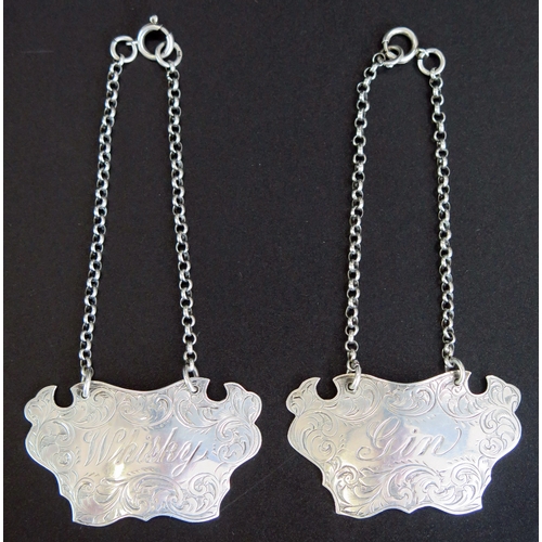 632 - A pair of George V silver spirit labels, maker George Unite, Birmingham, 1910, inscribed 'Gin' and '... 