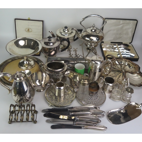 635 - A collection of assorted plated wares including tea pots, hot water jug, toast rack, flatwares, fish... 