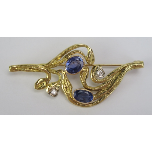 67 - A Modern 18ct Gold, Diamond and Blue Stone Foliate Brooch, 55.1mm wide, London 1984, maker AMB, 9.81... 