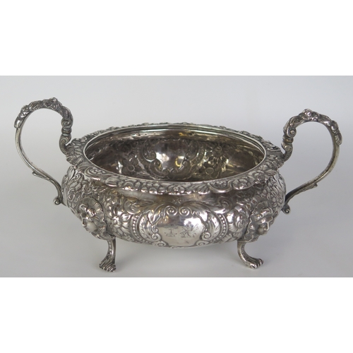 672 - A William IV Irish silver sugar basin, maker James Le Bas, Dublin, 1830,  crested, of circular form ... 