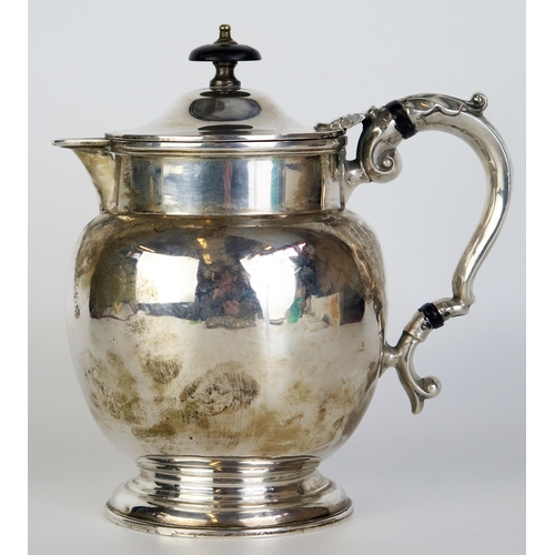 677 - An Edward VII silver lidded jug, maker, Fordham & Faulkner, Sheffield, 1903, of bulbous ovoid outlin... 