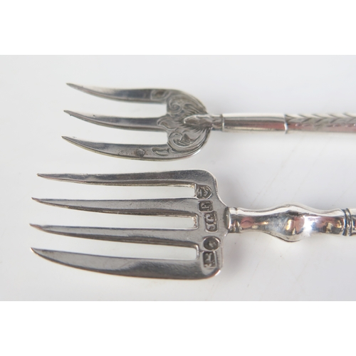 683 - Two Mother-of-pearl handled olive forks, various makers and dates,