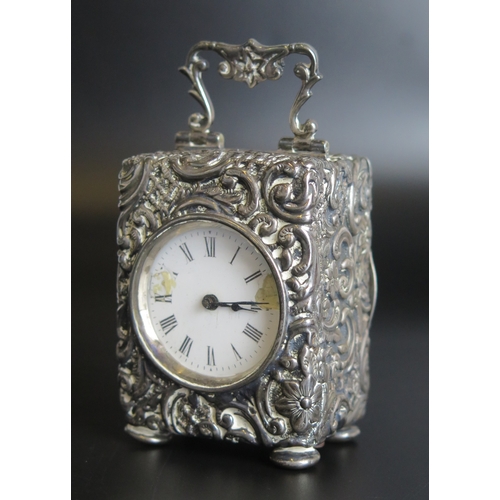 704 - An Edward VII silver cased bedside timepiece, maker 	Henry Matthews, Birmingham, 1903, of rectangula... 