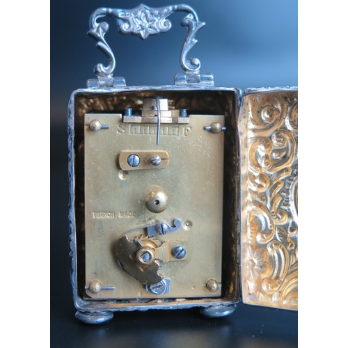 704 - An Edward VII silver cased bedside timepiece, maker 	Henry Matthews, Birmingham, 1903, of rectangula... 