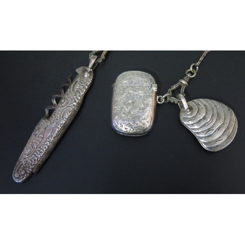 709 - *WITHDRAWN* A silver plated chatelaine with three chain suspensions with pen knife, aide memoire, ve... 