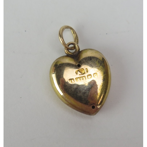 71 - An Antique 15ct Gold, Ruby and Old Cut Diamond Heart Shaped Locket, 21.5mm drop, Birmingham 1902, ma... 