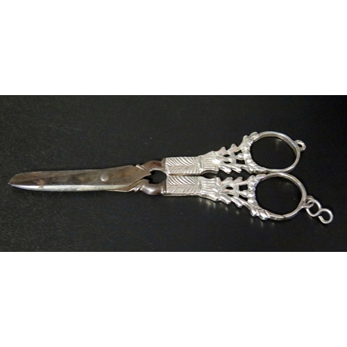 714 - A pair of Dutch silver handled scissors, with steel blades, 124.5cm long.