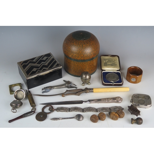 719 - A collection of assorted plated wares including coin holder, cigarette box, sovereign holder, treen ... 