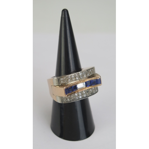 72 - A Deco Sapphire and Diamond Cocktail Ring in a precious yellow metal millegrain setting, c. 5x2.7mm ... 