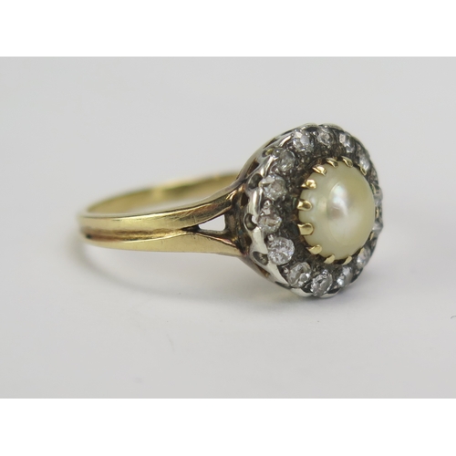 79 - An Antique Untested Pearl and Old Cut Diamond Halo Ring in a precious yellow and white metal split s... 