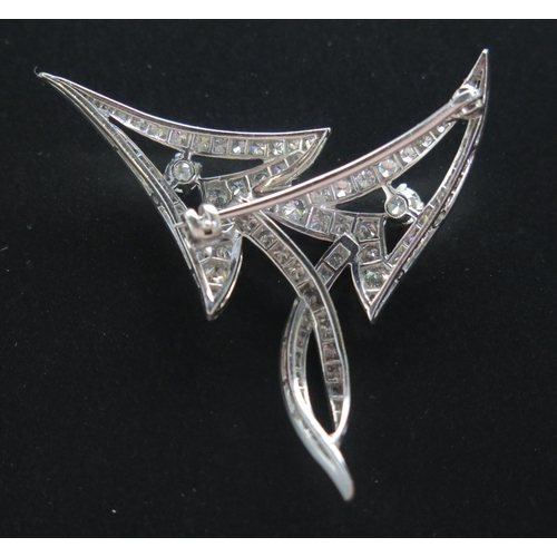 85 - An Art Deco Diamond Brooch in a precious white metal setting, largest stone c. 3.6mm, c. 47x43mm, 18... 