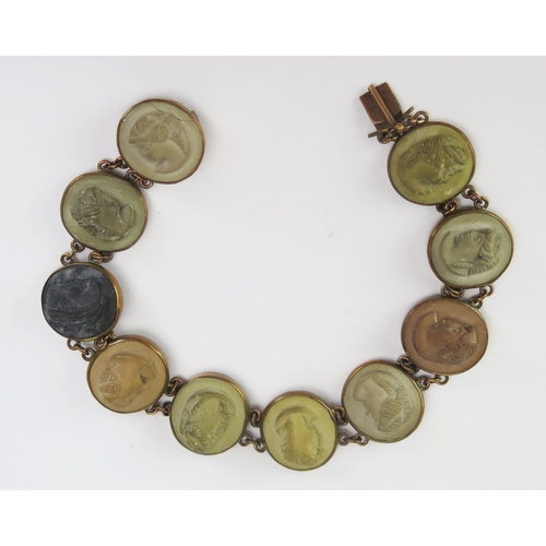 89 - A 19th Century Lava Cameo Panel Bracelet decorated with ten female busts in profile in a yellow meta... 