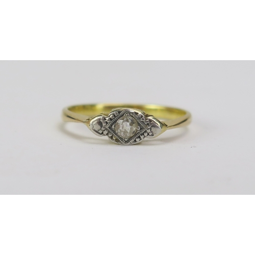 98 - An Old Cut Diamond Solitaire Ring in a precious yellow and white metal setting, KEE tested as 18ct, ... 