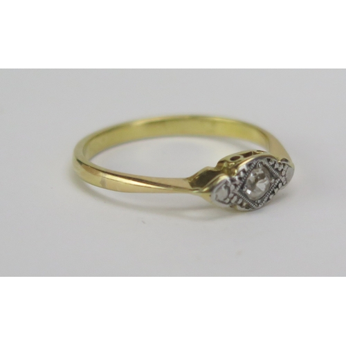 98 - An Old Cut Diamond Solitaire Ring in a precious yellow and white metal setting, KEE tested as 18ct, ... 