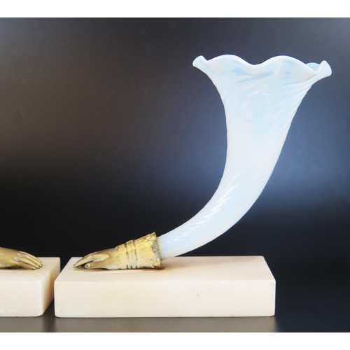 1002 - A pair of 19th century milk glass cornucopia on gilt metal glove shaped mounts, raised on rectangula... 