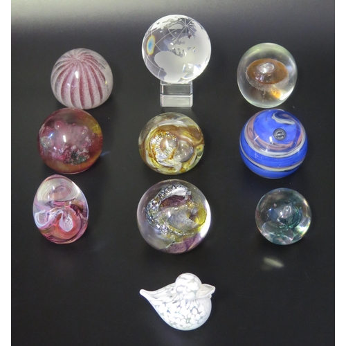 1013 - A collection of ten assorted glass paperweights, by various manufacturers, some boxed.