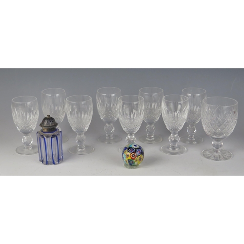 1021 - A set of eight Waterford crystal liquor glasses one other wine glass, paperweight and blue glass pep... 