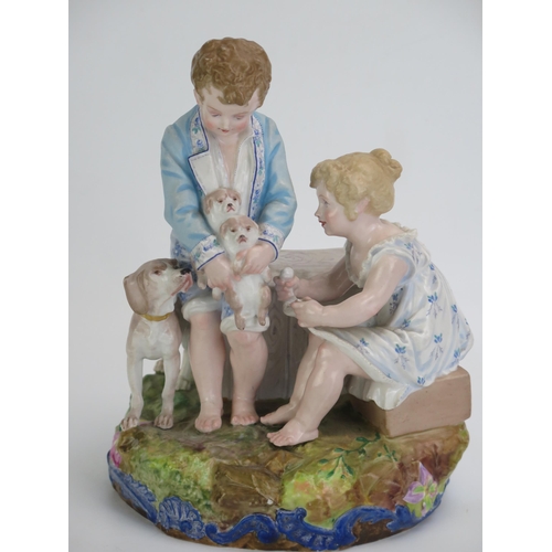 1054 - A Paul Duboy porcelain spill vase, decorated with a standing boy and seated girl playing with puppie... 