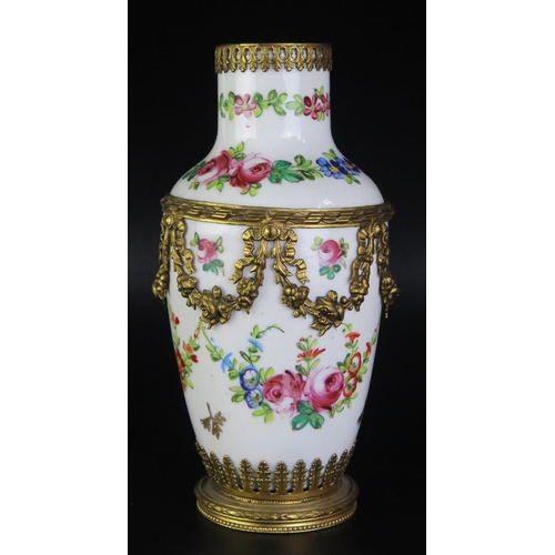 1077 - A Sevres porcelain and gilt metal mounted vase of ovoid form, with painted floral garland decoration... 