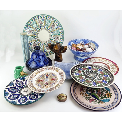 1080 - A Moroccan pottery tagine and cover, decorative wall plates, cabinet cups and saucers, sleeve vase e... 