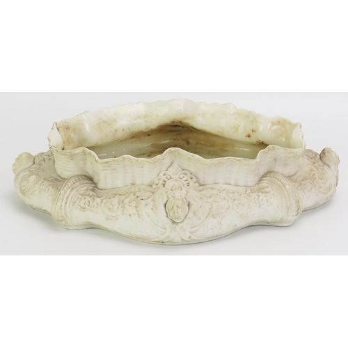 1084 - A late Victorian Parian porcelain table centrepiece, of cartouche-shaped outline, with cherub and fe... 