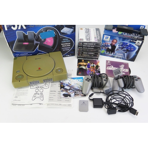 1268 - Playstation 1 with 2 original controllers, games, Gamester PSX Wheel and aftermarket controller (unt... 