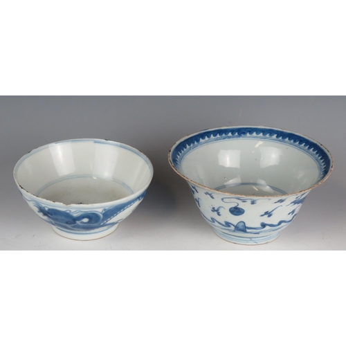 1337 - A Chinese provincial blue and white bowl decorated with a dragon, 15cm diameter, together with anoth... 