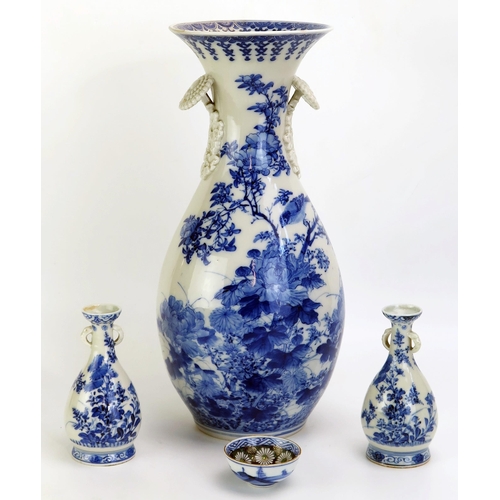 1342 - A large Chinese blue and white vase, of ovoid form with flared neck decorated with finches amongst f... 