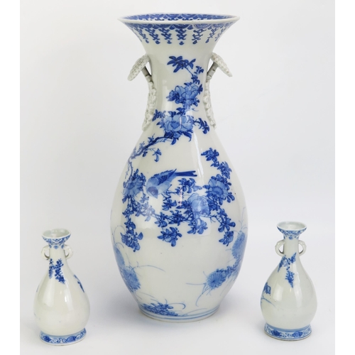 1342 - A large Chinese blue and white vase, of ovoid form with flared neck decorated with finches amongst f... 