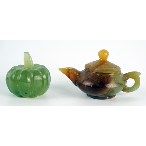 1349 - A polished jadeite miniature teapot and cover, 8cm long, together with a model of a pumpkin.