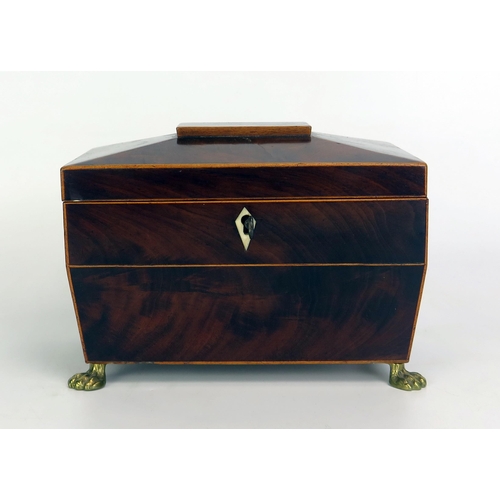 1403 - A Georgian mahogany and boxwood strung tea caddy of sarcophagus outline, the shallow domed hinged li... 