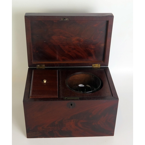 1413 - A 19th century mahogany tea caddy, of rectangular outline, the hinged lid enclosing a glass blender ... 